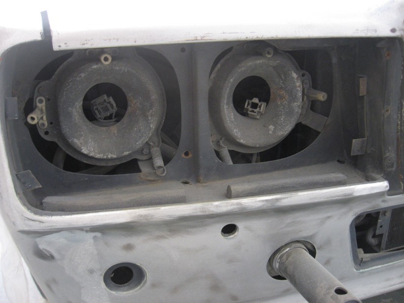 US headlight panel with buckets