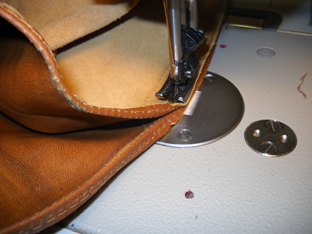 I don't know how it's possible, but all sewing uses the original holes in the leather!
