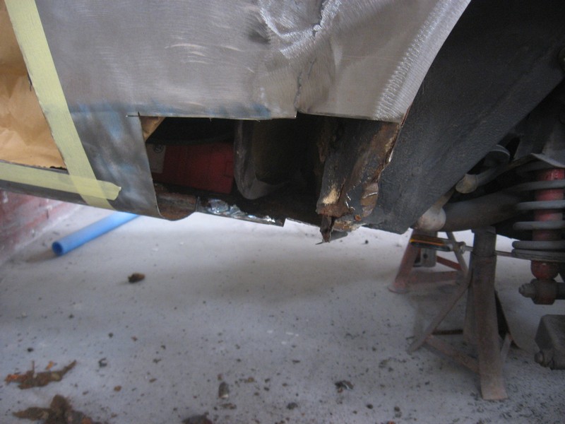 Rear wheel arch and trunk bottom being renewed