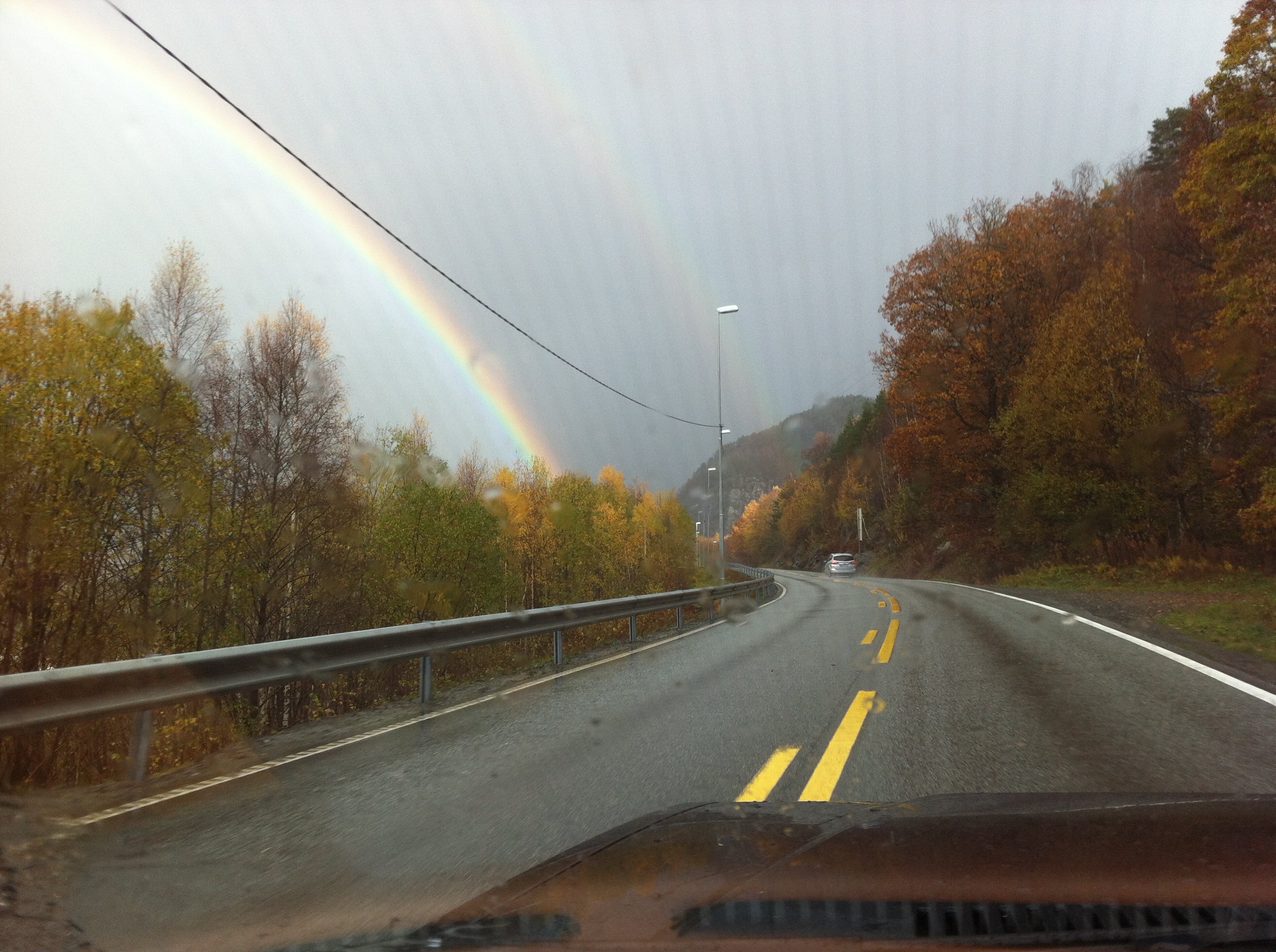 Double rainbow over  autumn colors 